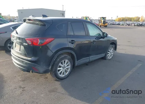 2014 Mazda Cx-5 Touring z USA, uszkodzony, nr VIN JM3KE4CY0E0372004